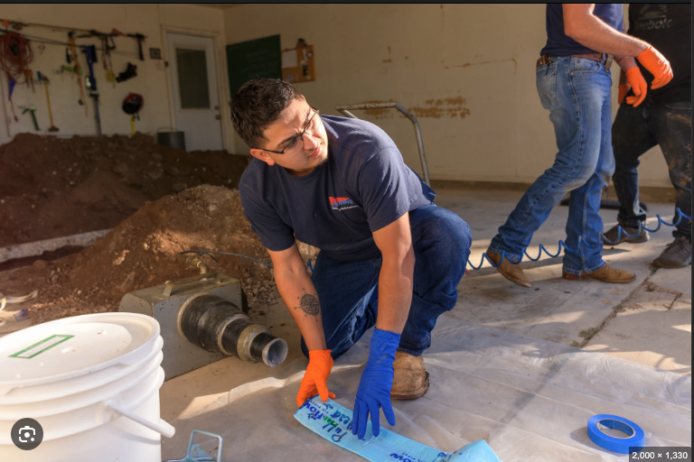 Plumber doing installation
